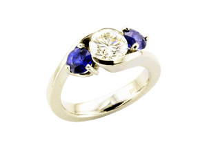 diamond and sapphire bypass ring